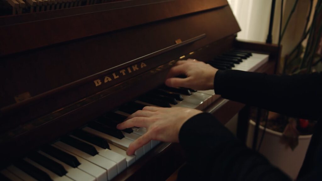 Piano Looking and Sounding Great with a Dust Cover